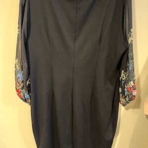 Elegant Black Dress with Floral Sleeves